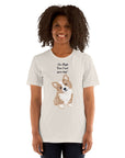 Woman wearing a playful "I'm High, Can I Pet Your Dog?" Milk Sandwich T-shirt with a cute corgi design, perfect for dog lovers.