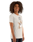 Woman wearing a soft unisexMilk Sandwich T-shirt with a cute corgi design and the phrase "I'm High, Can I Pet Your Dog."