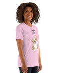 Woman wearing a soft pink Milk Sandwich T-shirt with a cute corgi graphic and the text, "I'm High, Can I Pet Your Dog."