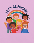 Close-up of a lilac Milk Sandwich t-shirt with a colorful print showing six diverse cartoon children smiling and waving under a rainbow, with the text "LET'S BE FRIENDS" above them.