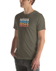 Side view of a man wearing a Milk Sandwich army t-shirt featuring a stacked relax text design in distressed white, blue, orange, and pink colors.