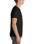 Side profile of a person wearing a black Milk Sandwich t-shirt featuring a vertical "Round Earth Society" graphic design on the front.