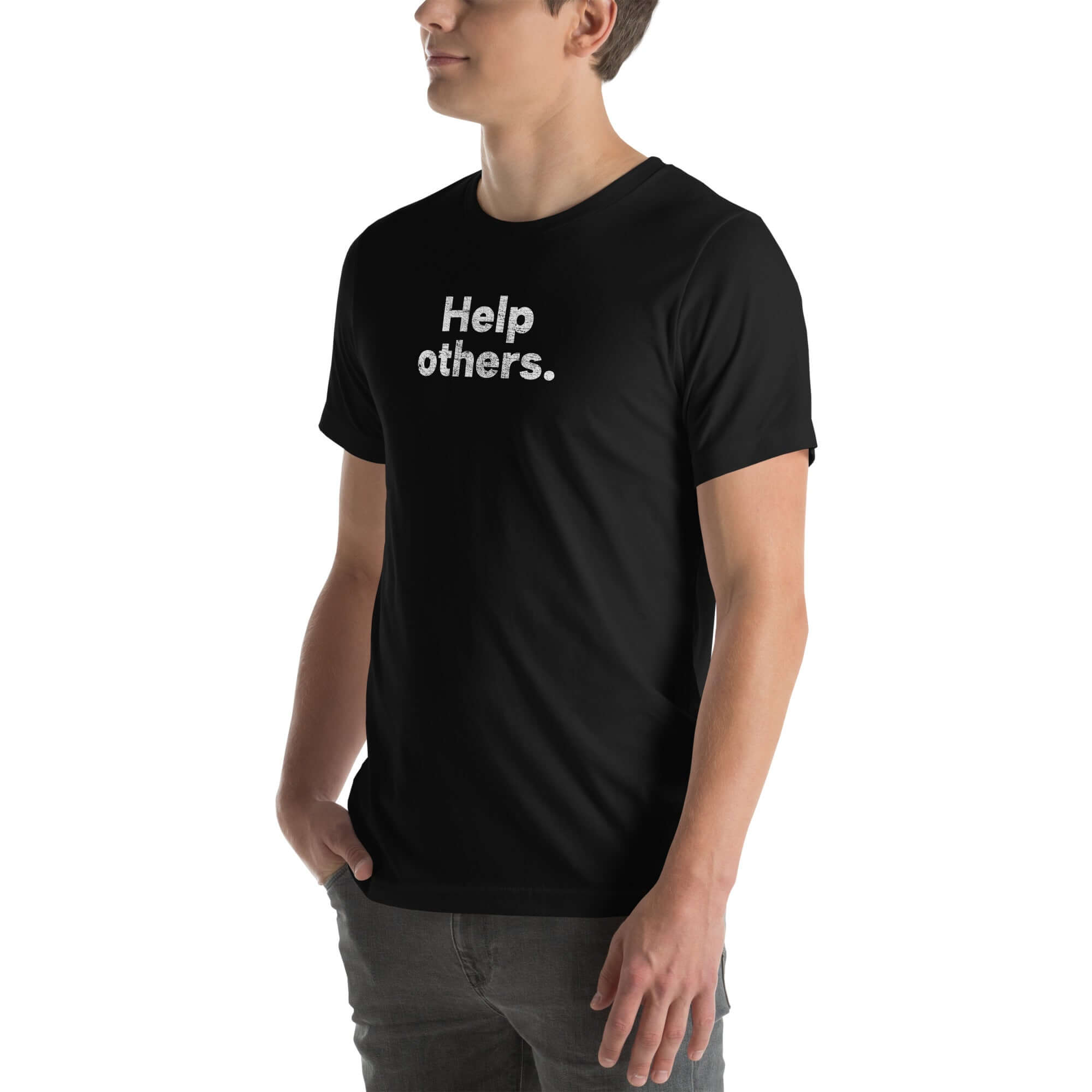 Side view of man wearing black Milk Sandwich T-shirt with distressed white Help others. text, casual unisex message tee with minimalist design.