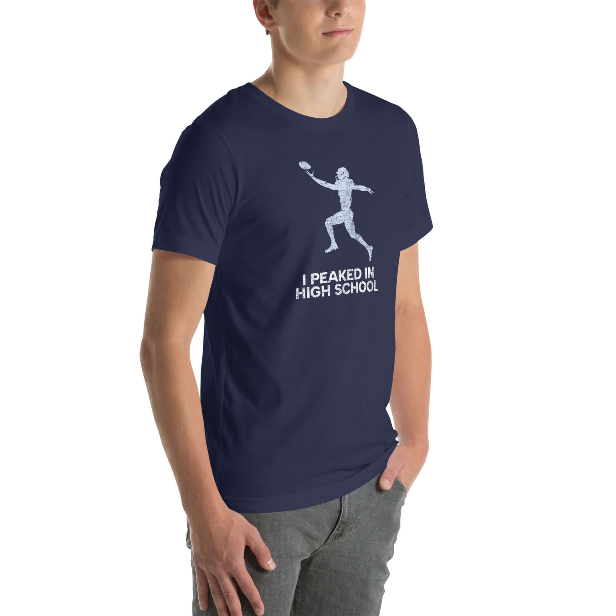 Unisex navy Milk Sandwich T-shirt with &quot;I Peaked In High School&quot; text and football graphic, perfect for sports enthusiasts and nostalgia lovers.