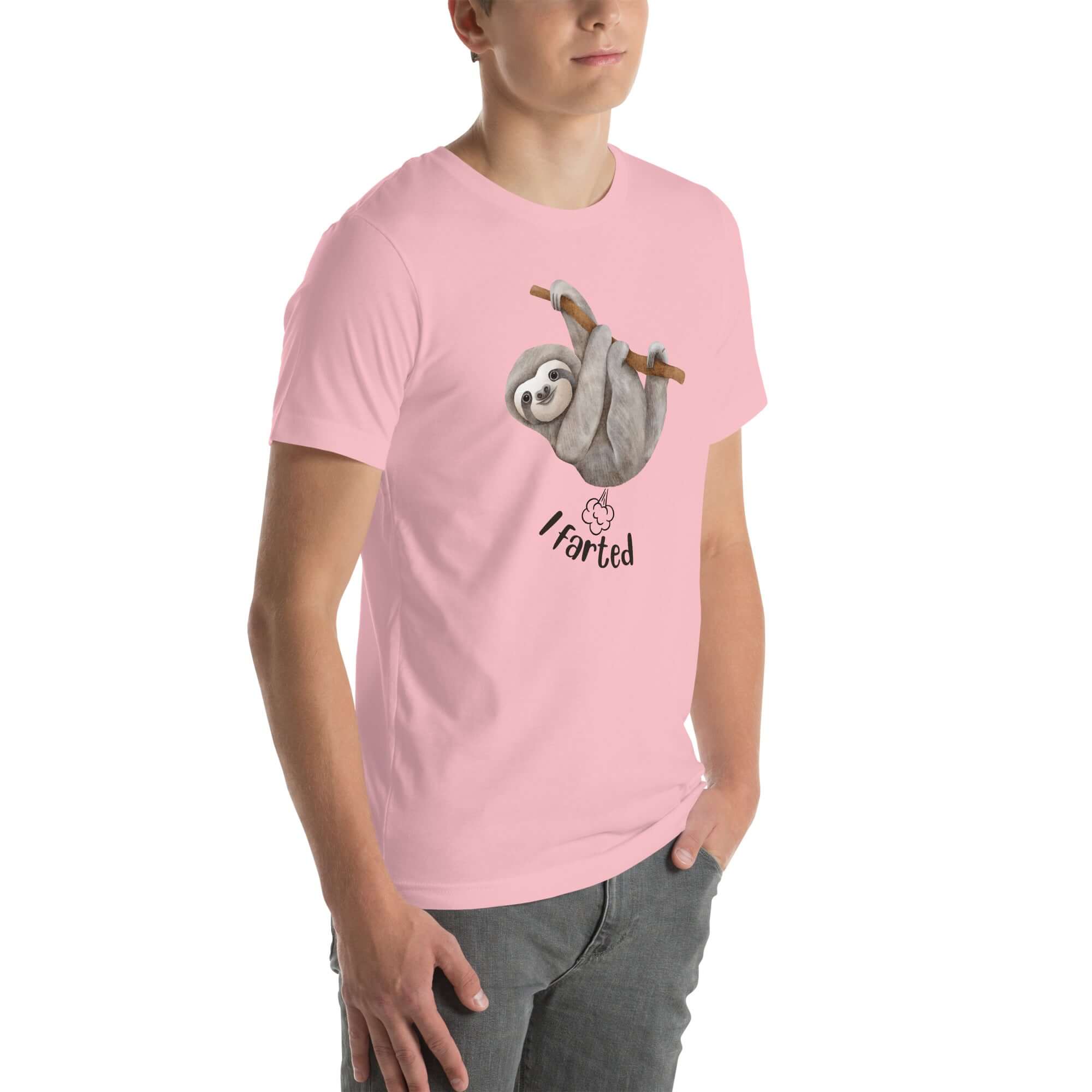 Side view of a man wearing a pink Milk Sandwich t-shirt featuring a playful cartoon sloth hanging from a branch with the phrase I farted and a small puff cloud illustration underneath.