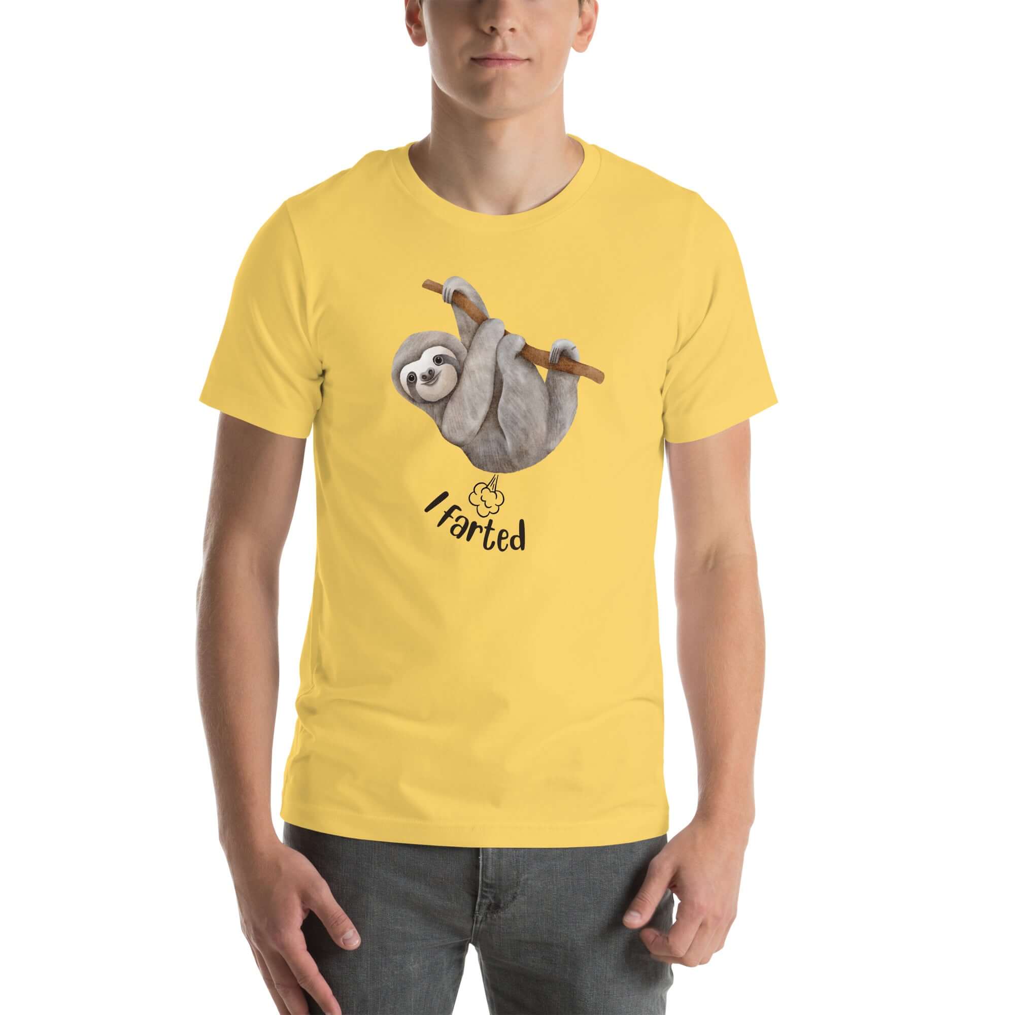 Man wearing a yellow Milk Sandwich t-shirt with a smiling cartoon sloth hanging from a branch and the humorous phrase I farted below a small illustrated puff cloud.