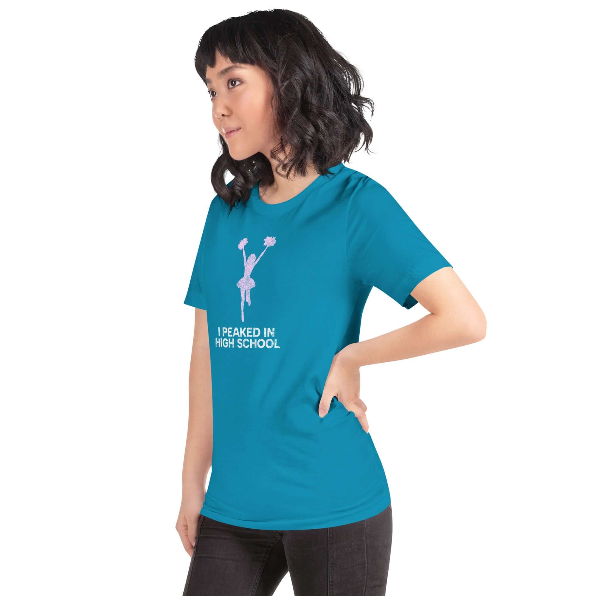 Unisex t-shirt in teal with &quot;I Peaked in High School&quot; design, showcasing a stylish fit and comfortable fabric.