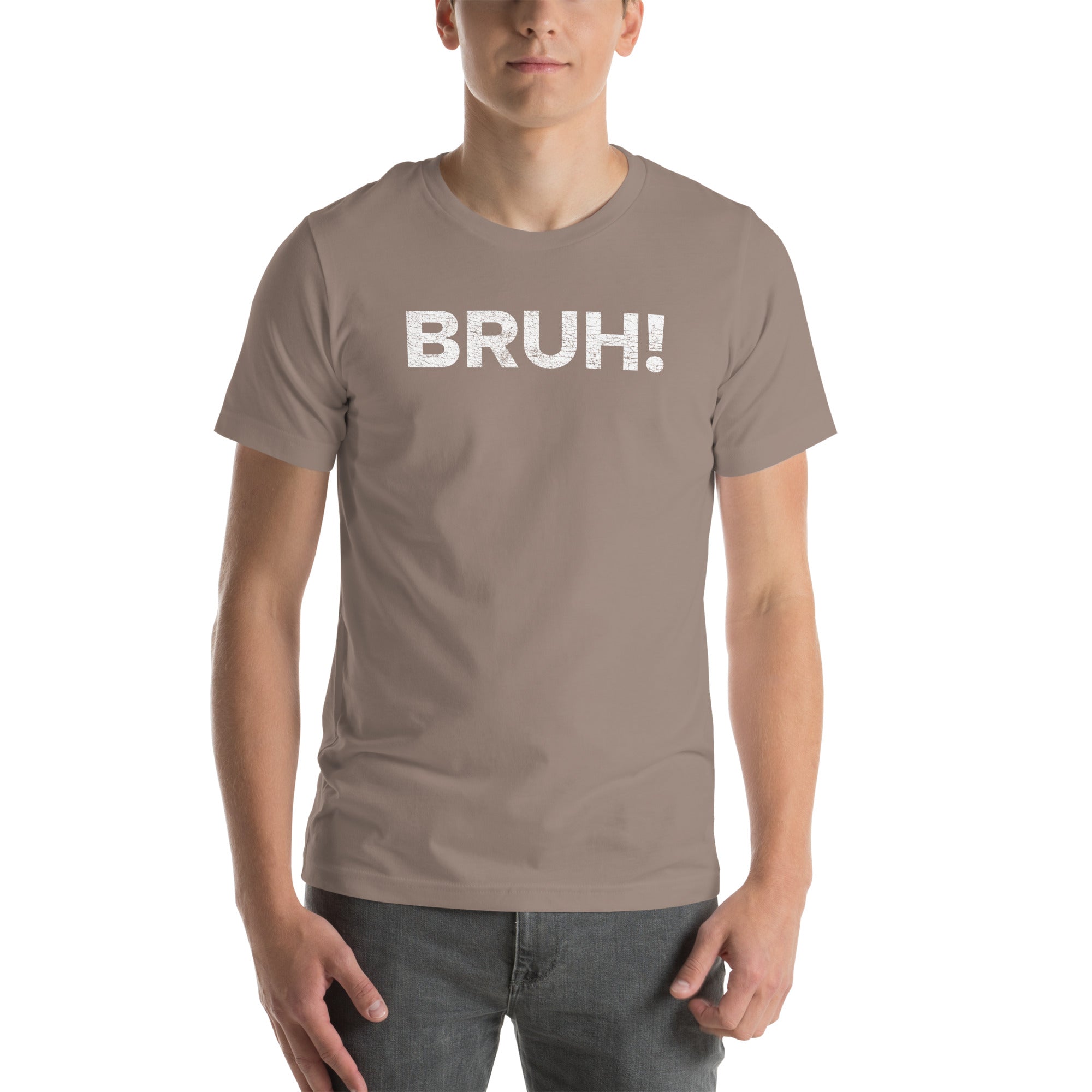 Man wearing a beige unisex T-shirt with the bold text &quot;BRUH!&quot; showcasing casual style.