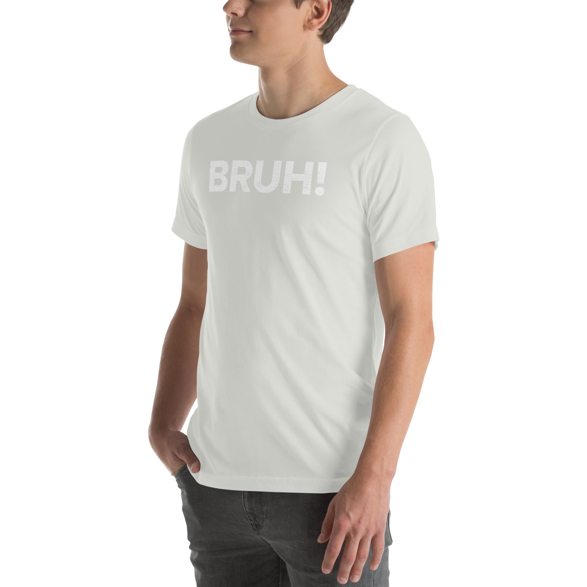 Model wearing a light-colored unisex T-shirt featuring the word &quot;BRUH!&quot; in bold, playful font.